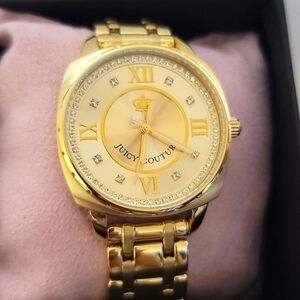 NWT Beautiful gold Juicy Couture watch with crystals around the face.